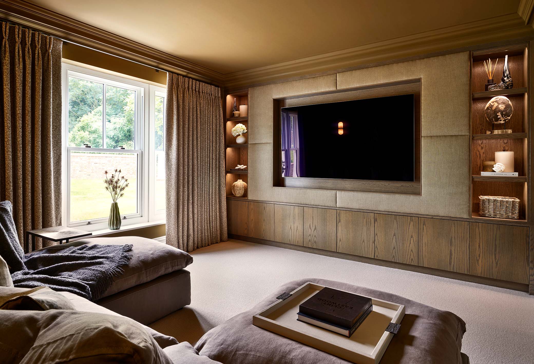 bespoke tv wall in a home cinema room in surrey
