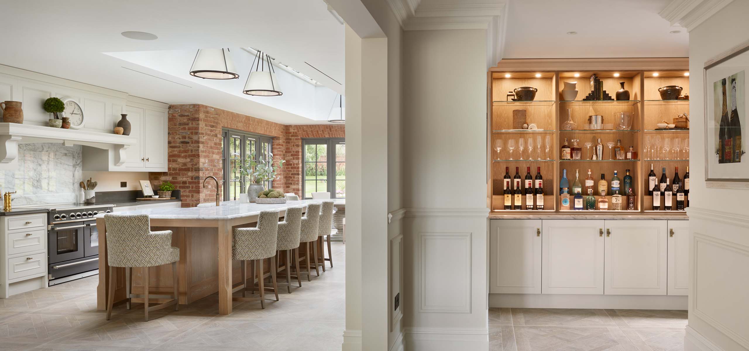 full view of a luxury classic kitchen and drinks area in a Charles Yorke renovation in Surrey