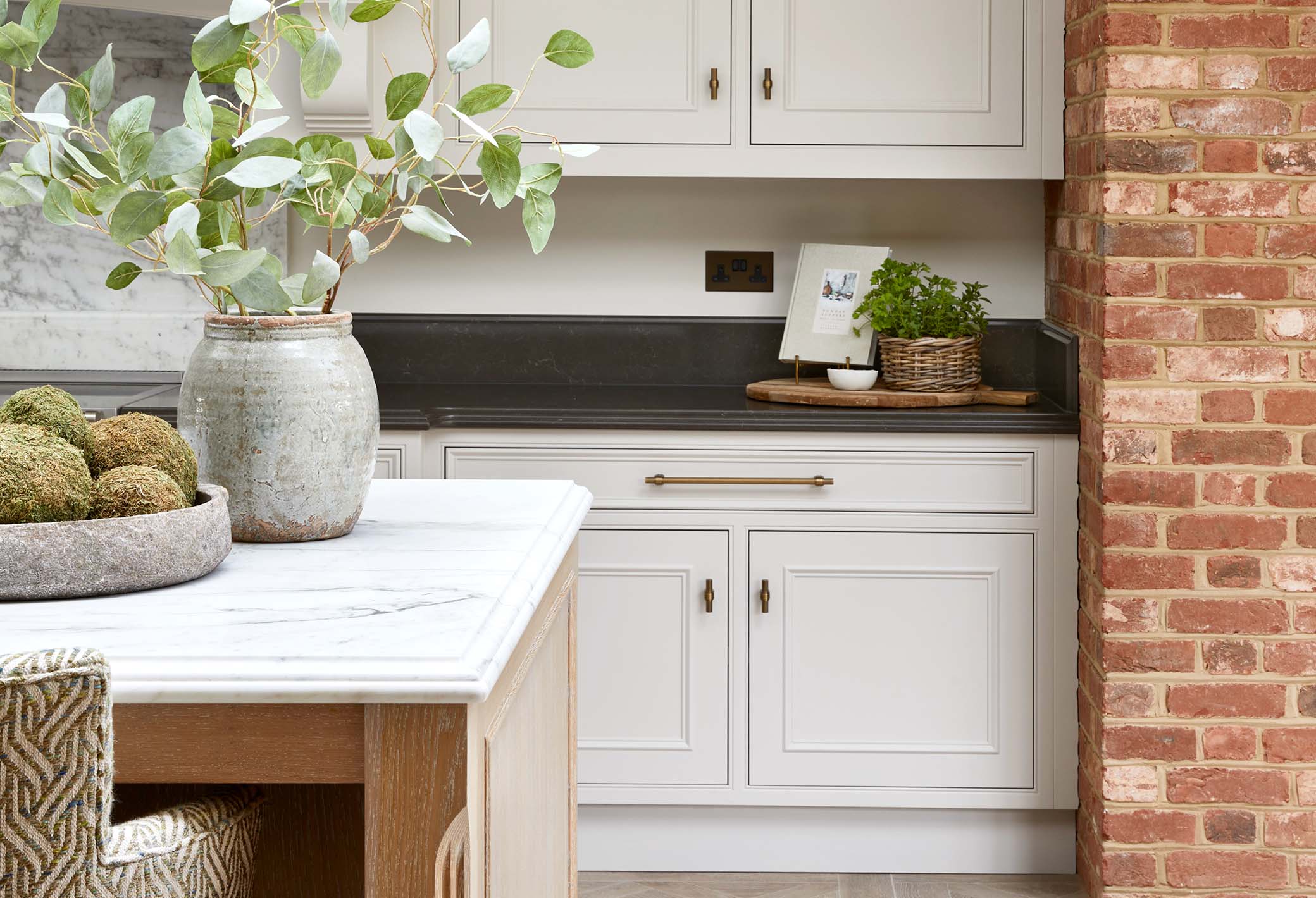 close up of a marble kitchen worksurface and englemere cabinets