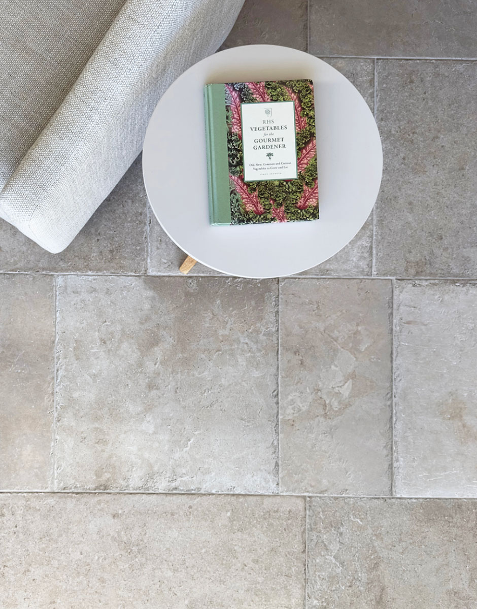 Natural Stone Tile Flooring in a Premium Kitchen Natural stone tile flooring in a premium kitchen interior design project